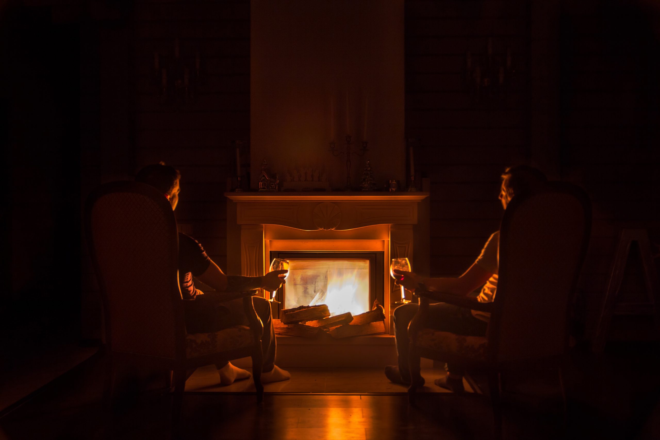 Couple Sitting by the Fireplace for their Date Night in AZ