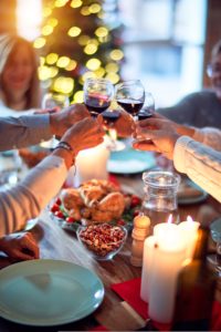 Cheers around the Christmas tree after Christmas catering from Aioli