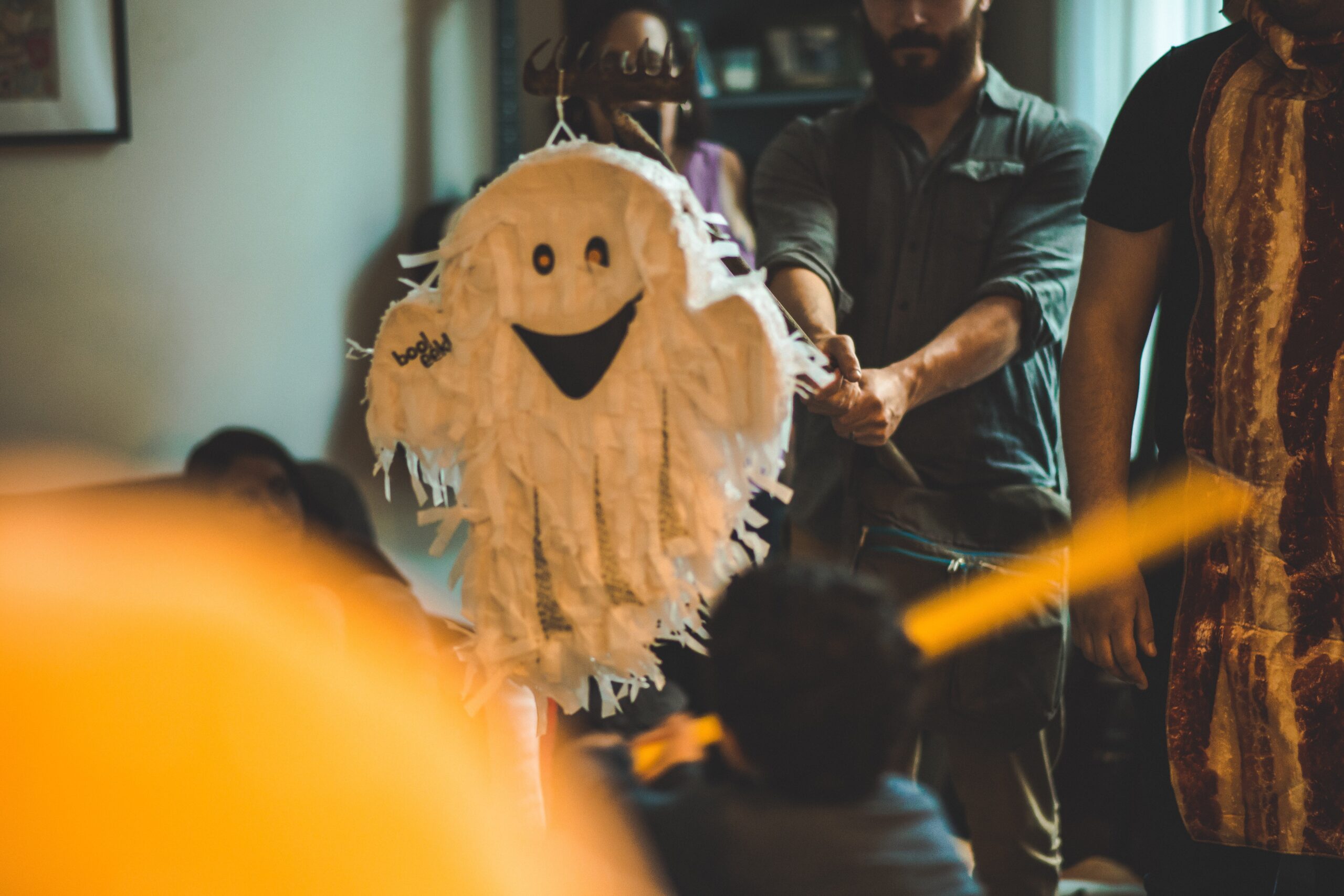 A Halloween party with a ghost piñata
