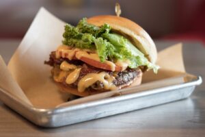 One of our lovingly crafted burgers, voted best cheeseburger in Phoenix!