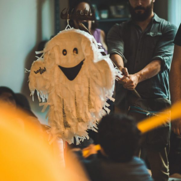 A Halloween party with a ghost piñata